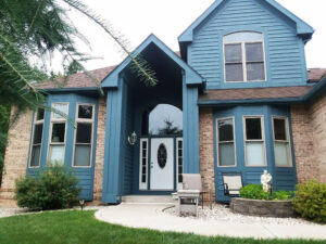 Blue and Brick House | Paint Your Home with Expert Exterior Painters in Kalamazoo, MI | Van Tuinen Painting
