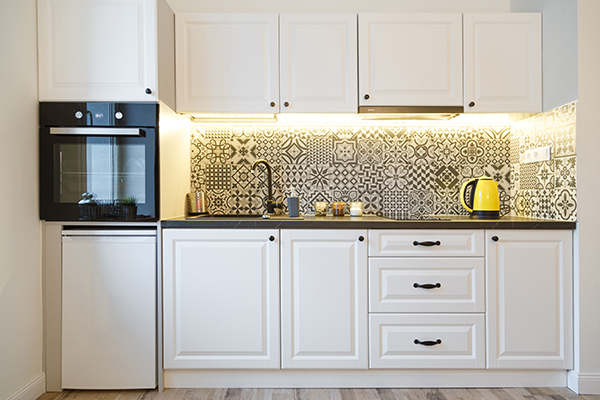 Kitchen cabinets that have received interior painting services from Van Tuinen Painting.