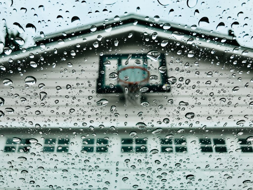 a rainy view of a garage