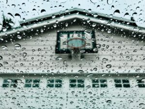 a rainy view of a garage