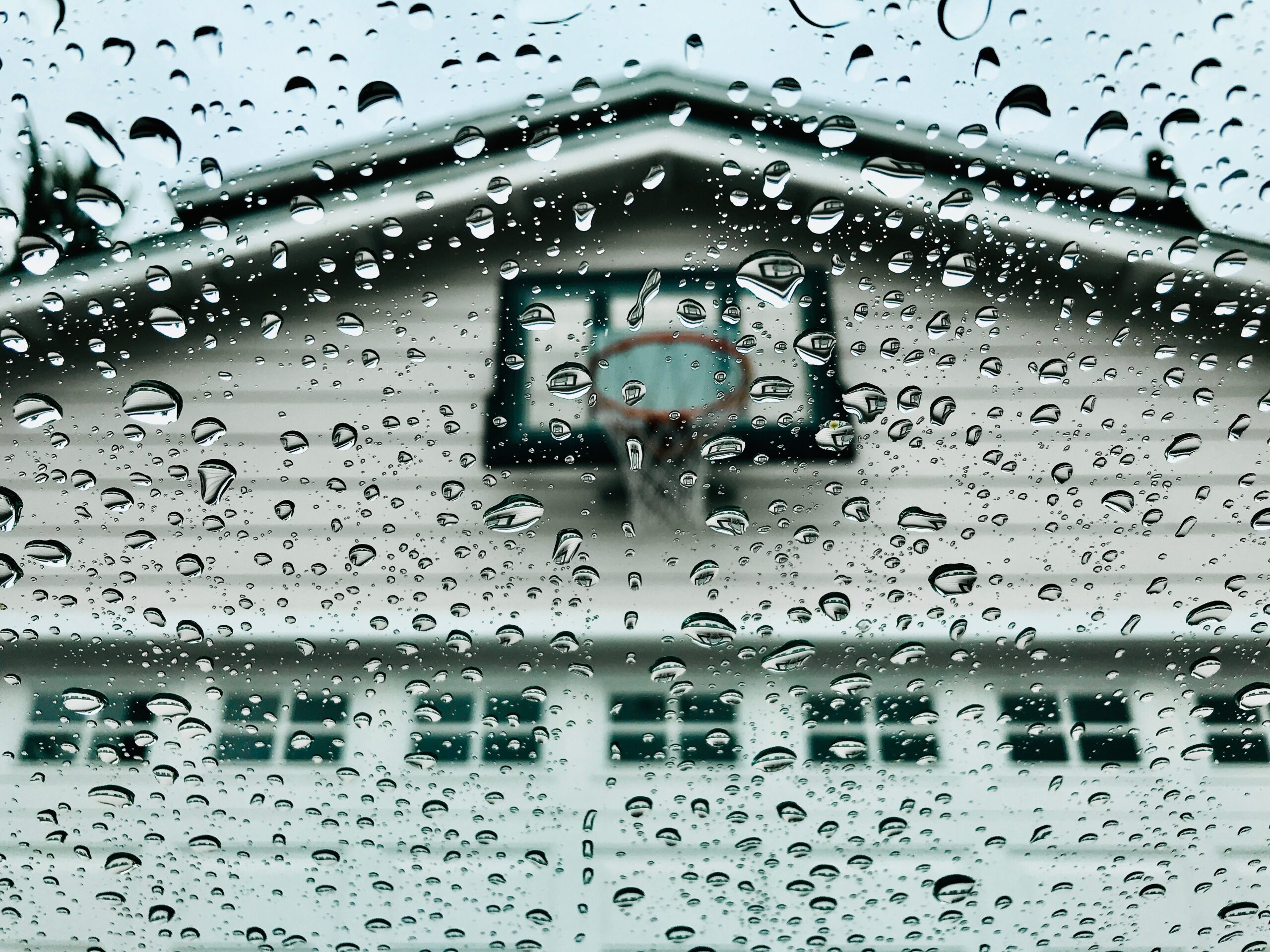 a rainy view of a garage