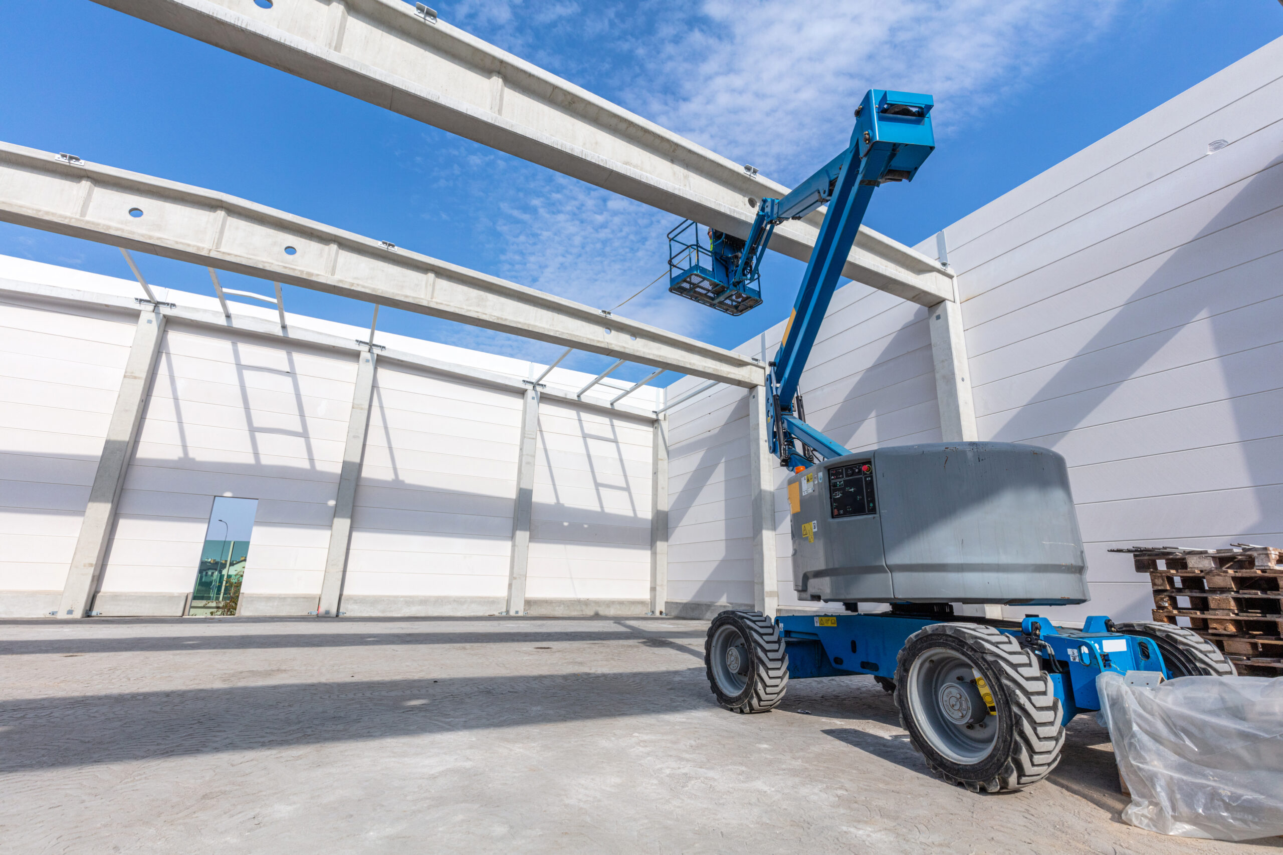 warehouse being painted during construction